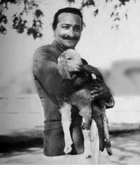 Meher Baba with pet goat