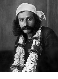 Meher Baba with garland